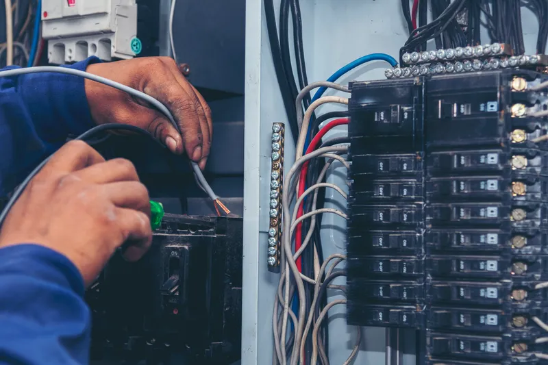 Electrician performing electrical repairs and troubleshooting in Delmar DE